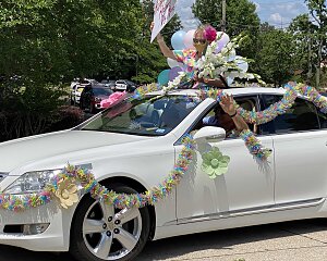 family and friends supported seniors during car parades
