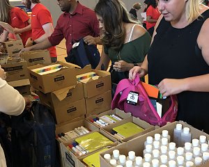 halliburton employees filled backpacks for children served by buckner in houston