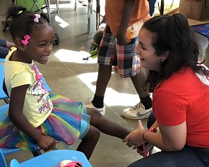 volunteers helped outfit buckner family hope center kids with new shoes for school